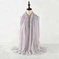 Light grey solid color crinkled cotton linen scarf with fringe on a mannequin - Light Grey