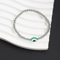 Silver stainless steel beaded bracelet with a green and white enamel eye-shaped charm - Green Eye Style (NS10-2)