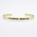 Gold-plated stainless steel cuff bracelet engraved with Peaceful Warrior quote - PEACEFUL WARRIOR