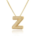 Detailed view of golden letter Z pendant with micro-pave cubic zirconia on box chain - Letter Z