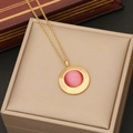 Detail of pink cat-eye stone pendant on golden stainless steel necklace in jewelry box - 1# Necklace / Gold with Pink Cat Eye Stone