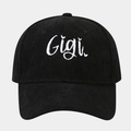 Detailed close-up of Gigi embroidery on a black corduroy texture baseball cap - Adjustable / Black