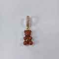 Brown resin gummy bear pendant necklace with gold plated zircon bail on white background - Dark Coffee