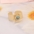 Close-up of gold stainless steel ring with turquoise stone and sunburst pattern - Round Turquoise Sunburst Design (5#)