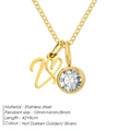Elegant gold stainless steel necklace featuring a script initial V and a clear birthstone - Letter V / Gold