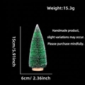 Detailed view of a 15cm mini sisal Christmas tree with snow effect and wooden base - No Packaging / 15CM Grass Green