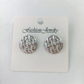 Vintage irregular silver round stud earrings with spiral woven texture on white card - Circular Weave / Steel
