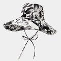 Détail d'un chapeau de soleil à fleurs noir et blanc avec rubans de serrage assortis - Noir Blanc Artistique Fleuri (Couleur 10#)