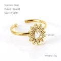 Detail of sunflower ring showing 18k gold plated steel and zircon stone specs - Gold with White Zirconia