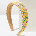 Macro shot of colorful sprinkles on a wide headband with brown anti-slip suede lining - Yellow Mixed