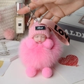 Pink sleeping doll plush fur pompom keychain with knitted hat and metal buckle clip - Pink