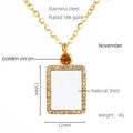 Detail of 18K gold plated necklace with shell pendant and November zircon specs - November Golden Zircon Style (ZN703G-11)