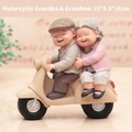 Elderly couple on a vintage beige scooter figurine made of resin for home decor - Old Couple Figurine / 1041-4 Motorcycle