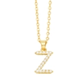 Detailed close-up of golden necklace pendant with letter Z and small pearls inlay - Gold Letter Z