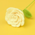 Close-up of handmade crochet Thai rose in yellow cotton yarn with green leaves and stem - New Yimian Thread Thai Rose Bouquet - Light Yellow