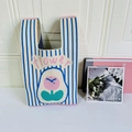 Blue and white striped knit tote bag with pink flower pattern and flower text - Tulip Striped Blue