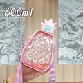 Close-up of 600ml pink pineapple straw bottle with heart pattern strap and clear body - 600ml / Pink