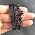 Three-piece black Roman numeral bracelet set featuring a braided rope and crown charm - Roman Beaded Crown Black Set