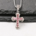 Detail of silver cross pendant with pink center stone and sparkling clear zircon gems - Pink / Box Chain 60cm