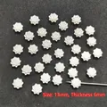 Detailed view of 13mm white flower resin bead accessory for DIY jewelry making - 13mm Triple-layer Flower