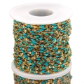 Golden stainless steel chain with turquoise beads on a white plastic spool - Gold-Light Blue