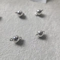 Polished silver spherical magnetic clasps for DIY jewelry making on grey felt surface - Small 6mm / Silver (White K)