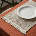 Handwoven cream cotton table runner with bohemian tassel fringe on a warm brown surface - 30*50cm / Beige Hollow Star Flower Pattern