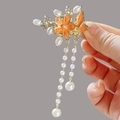 New Chinese style orange floral hair clip with pearl tassels and golden metal finish - F1510 Orange Flower