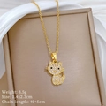 Close-up of gold cat necklace with sparkling crystals and size details on silk background - Cat Pendant Necklace (P429)