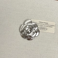 Detailed macro view of silver camellia brooch with layered metallic petals and glossy finish - 24 Silver Camellia Flower (Z-4601)