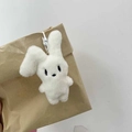 Cute white plush bunny keychain with plastic hook on a paper bag student backpack gift - Keychain / White