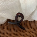 Elegant twisted hair claw clip in deep brown finish for vintage women hairstyle - Frosted Amber