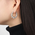Minimalist scalloped silver earrings in wave shape worn by female model - Steel Color (F1195-Steel Earrings)