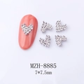 Detail of 7x7.5mm silver heart nail art alloy stud with crystal diamond on pink nail - Silver Irregular Sparkling Heart (8885)
