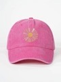 Close-up of peach pink washed cotton baseball cap featuring sun embroidery and fabric texture - Adjustable / Rose Red