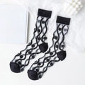 Sheer black mesh crew socks featuring elegant wavy lines and polka dot pattern for women - One Size / Black Waves