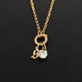 Collier en acier inoxydable plaqué or 14 carats avec cristal et breloque lettre B - Lettre S