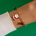 Bracelet de Noël doré avec pendentif Père Noël et perles de cristal rouges et vertes - Style Père Noël(25671-colour)