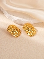 Detailed shot of gold plated woven texture earrings on stone and silk background - Multi-layer Pleated Earrings