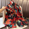 Black silk scarf with red leaf pattern and blue dots draped over beige knitwear - 90*180cm / Red Black