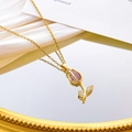 Elegant gold tulip necklace with pink opal pendant and zircon leaves on a cable chain - Purple Cat Eye Necklace / Gold