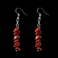 Close-up of irregular red natural crystal stone bead dangle earrings with silver hooks - Natural Stone Earrings / Red Jasper