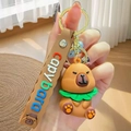 Porte-clés Capybara mignon avec breloque en silicone brun et lanière à imprimé - Feuille Verte