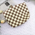 Brown checkered corduroy toiletry bag shown top-down with tulips and magazine - Beige Plaid