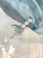Clip de pelo cola de sirena plateado con esmalte azul y perlas sobre olas - Cola de Pez Perla