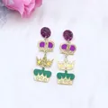 Festive multi-layer crown drop earrings with purple and green acrylic tiers - Crown