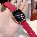 Minimalist square watch with rose gold case and red silicone strap worn on wrist - Red Strap Rose Gold Case