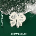 Detailed view of white lace bow patch with size measurements of 3.9cm by 4.3cm - White Elegant Bow Style (09)