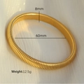 8mm wide gold stainless steel ribbed cuff bracelet with elastic snake bone texture - 8mm Wide (60mm Diameter) / Gold
