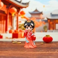 Q-version Chinese figurine in red Tang suit with golden hairpiece and pink flower - Shengjin